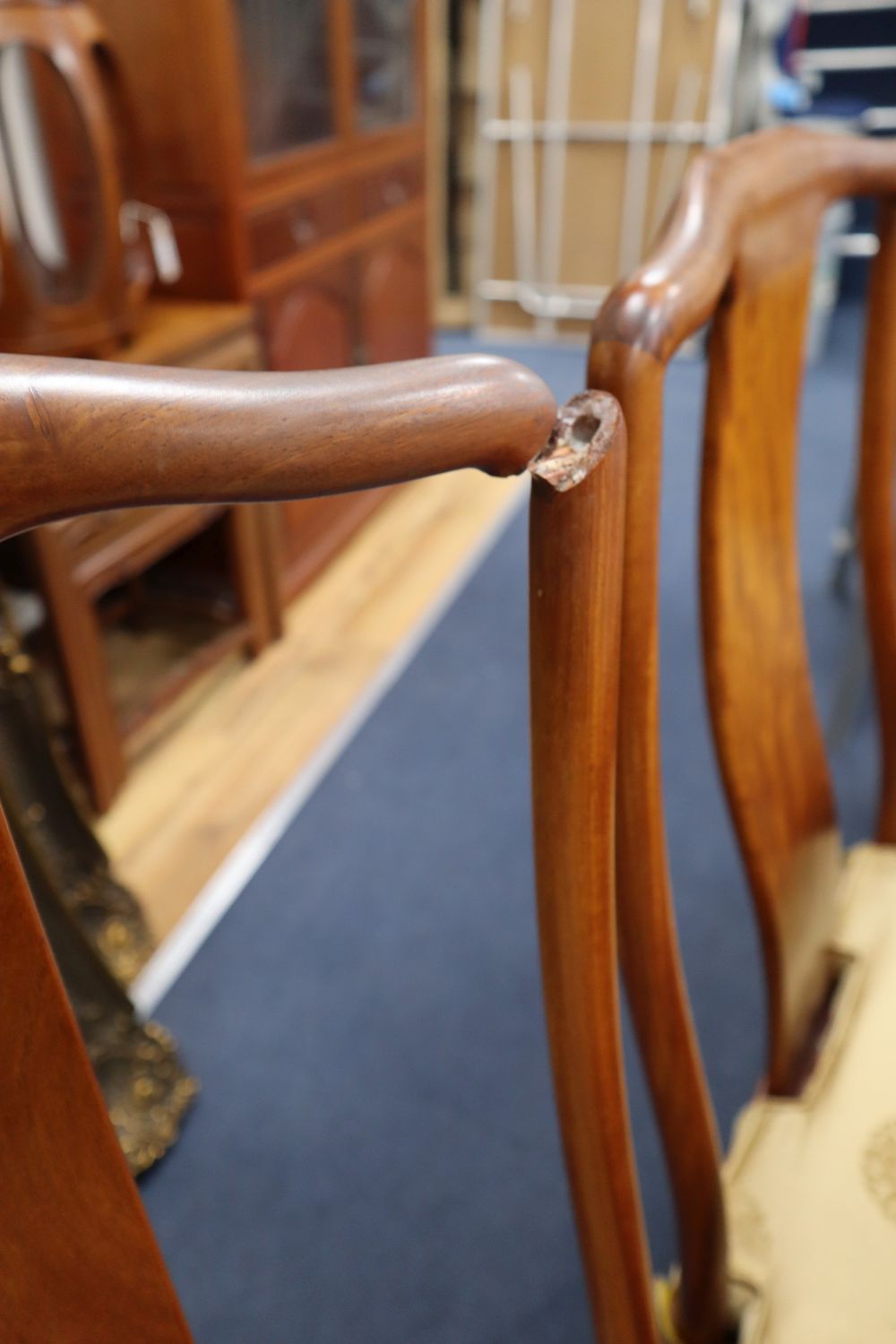A Chinese hardwood dining table, 234cm extended (three spare leaves), width 112cm, height 76cm and eight chairs